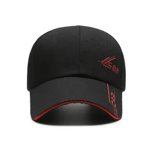Detailed view of the black baseball cap featuring red trim and sport style embroidery.