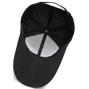 Black baseball cap inner lining detail, breathable mesh construction, quality stitching.