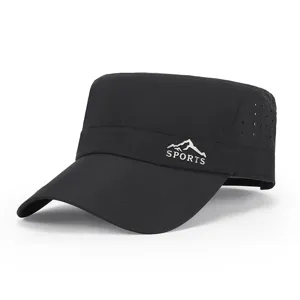 Detailed view of the black quick-dry outdoor flat top cap with side ventilation holes.