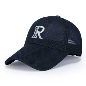 Detailed view of the breathable navy blue mesh baseball cap with white embroidered letter R.