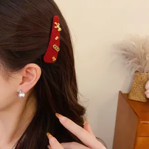 Red plush hair clip with cute gold metal charms, vintage winter hair accessory for women