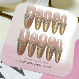 Uñas postizas hechas a mano nude oro ojo de gato pedrería 10pz press on nails chic