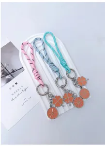 Leuke klavervier sleutelhanger en tasoettoestel accessoire voor dagelijks gebruik.