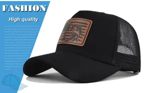 Black trucker hat with leather fishing patch, breathable mesh back and curved sun brim.