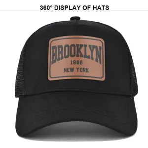 Black mesh baseball cap with brown leather patch, breathable summer sun hat for outdoor sports.