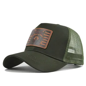 Green mesh trucker hat with leather patch featuring raccoon design, breathable baseball cap.