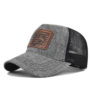 Grey mesh trucker hat featuring brown leather patch, perfect for outdoor fishing and daily wear.