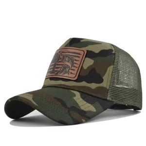 Detailed view of camo trucker hat with leather fishing patch, breathable mesh back design.