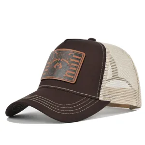 Brown mesh trucker hat with raccoon leather patch, stylish summer baseball cap for men and women.