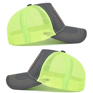Detailansicht der dunkelgrauen und neongelben Mesh-Trucker-Baseballcap mit Lederaufnäher.