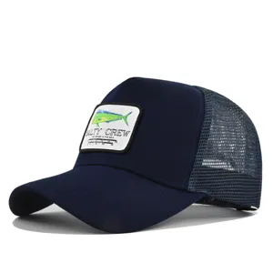 Navy blue mesh trucker hat with embroidered fish patch and curved brim for summer.