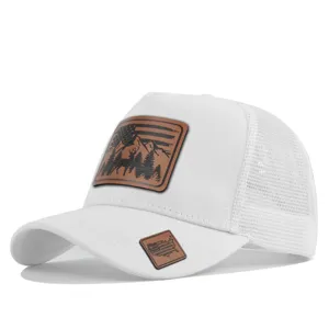 Closeup detail shot of the white trucker mesh baseball cap with stylish leather patch design.