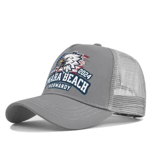 Grey trucker baseball cap with mesh back and vintage Omaha Beach eagle graphic print.