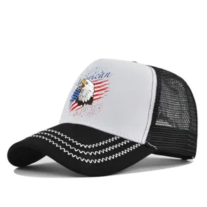 Detailed view of the breathable mesh trucker hat featuring front eagle and flag graphic.