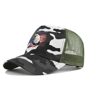 Camouflage mesh trucker hat detail view featuring an American eagle and flag graphic print.