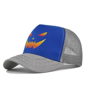 Detailed view of the Halloween pumpkin face trucker hat featuring breathable mesh and grey brim.