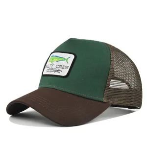 Detailed view of the mesh baseball cap with embroidered fish patch and curved brown brim.