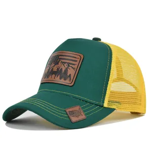 Green and yellow mesh trucker hat with deer mountain leather patch detail, summer outdoor cap.