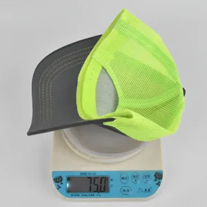 Mesh baseball cap detail view showing lightweight trucker hat design with adjustable snapback strap.