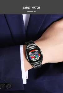 Close-up detail of a sleek black quartz watch with stainless steel strap worn on a business suit.
