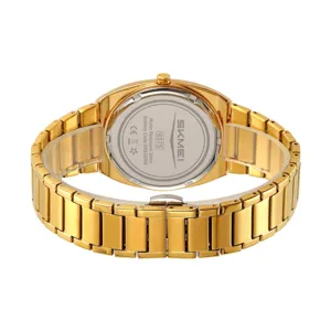 Gold stainless steel quartz men's watch featuring 3atm water resistance and secure clasp.