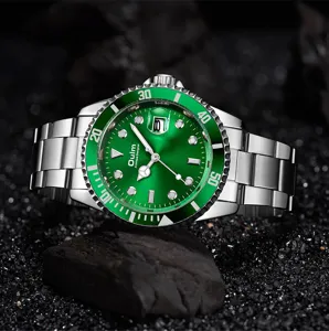 Green dial quartz men watch detail, stainless steel strap, luminous hands and date display.