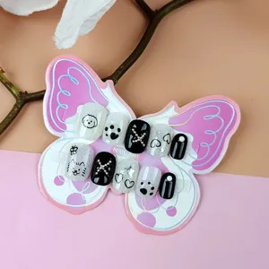 10pcs uñas postizas de perrito de dibujos animados para niños, estilo dulce negro y blanco.