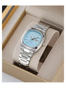 Detailed view of the SKMEI quartz watch featuring a stylish light blue dial and steel strap.