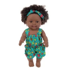 Detalles de la linda muñeca reborn negra afro de 30 cm con mameluco y diadema coloridos.