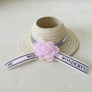 Miniature doll straw hat accessory, cute woven sun hat with pink chiffon flower and ribbon.