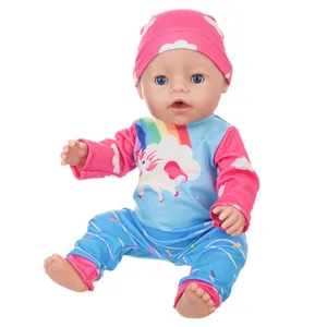 Detailed view of the 43cm doll featuring cute rainbow unicorn clothes and a pink cloud hat.