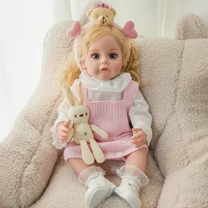 22-inch reborn baby doll vinyl simulation infant toy with pink knitted romper and cute bunny.
