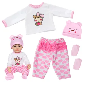 Cute 22 inch reborn baby doll clothes set with pink heart pants and bear hat outfit.
