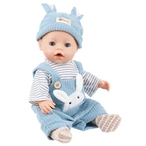 Cute 43cm baby doll with blue corduroy rabbit ear hat and matching overalls outfit.