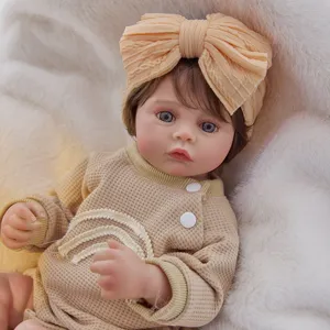 Cute reborn doll clothes set featuring waffle romper and bow headband for 18-22 inch dolls.