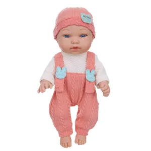 Detailed view of an 11-inch reborn baby doll in a cute knitted pink outfit and matching hat.