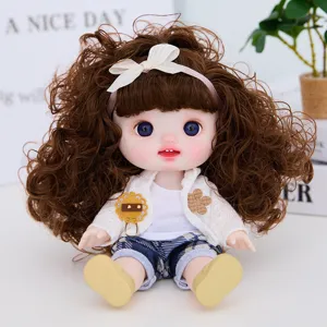 Detailed close-up of the cute 9-inch vinyl doll showcasing curly hair and stylish outfit.