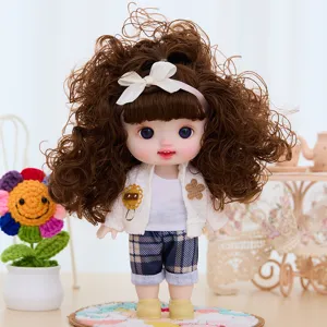 Close-up details of a 9-inch movable vinyl doll wearing cute plaid shorts and jacket.