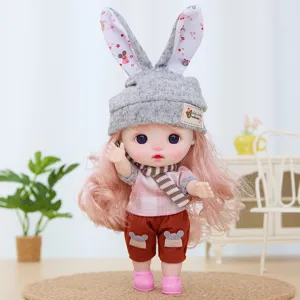 Cute 9-inch vinyl doll toy with bunny ears hat and fashionable clothes for girls gift.