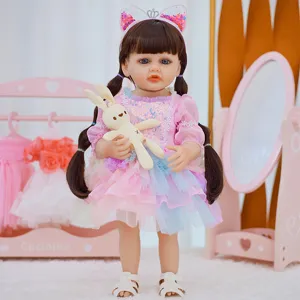 Cute 18-22 inch reborn baby doll with beautiful princess dress and cute bunny toy accessory.