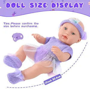 Detail view of a 12-inch reborn baby doll set in purple, featuring cute clothing and a pacifier.