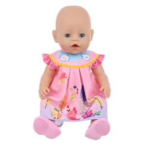 Details of the 43cm doll summer pink dress featuring cute bird and cloud cartoon prints.