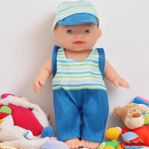 Detailed view of the cute 5.5-inch baby doll featuring striped romper and matching cap.