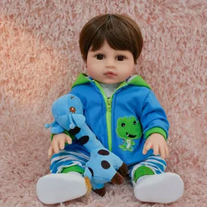 Close-up detail view of 45cm reborn baby vinyl doll wearing blue hoodie holding toy