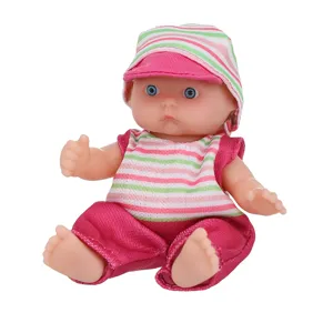 5.5-inch mini baby doll detail shot, wearing cute striped hat and pink outfit set.