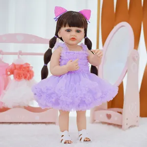 Detailed view of 22-inch reborn baby doll in purple dress with cat ears headband and cute sandals.