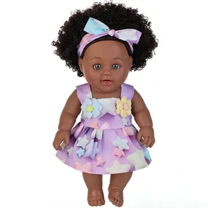 12-inch vinyl soft black doll with afro hair, purple star dress and floral headband main view.