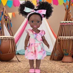 Cute 35cm 14-inch African baby doll featuring curly hair, pink star dress and cute headband.