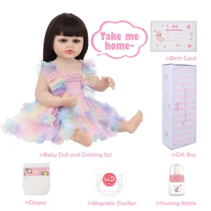 Reborn baby doll set detail showing 22-inch vinyl doll with colorful dress, pacifier, bottle.