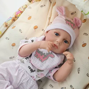 45cm reborn baby doll vinyl cute infant lifelike toddler toy with pink dinosaur outfit detail view